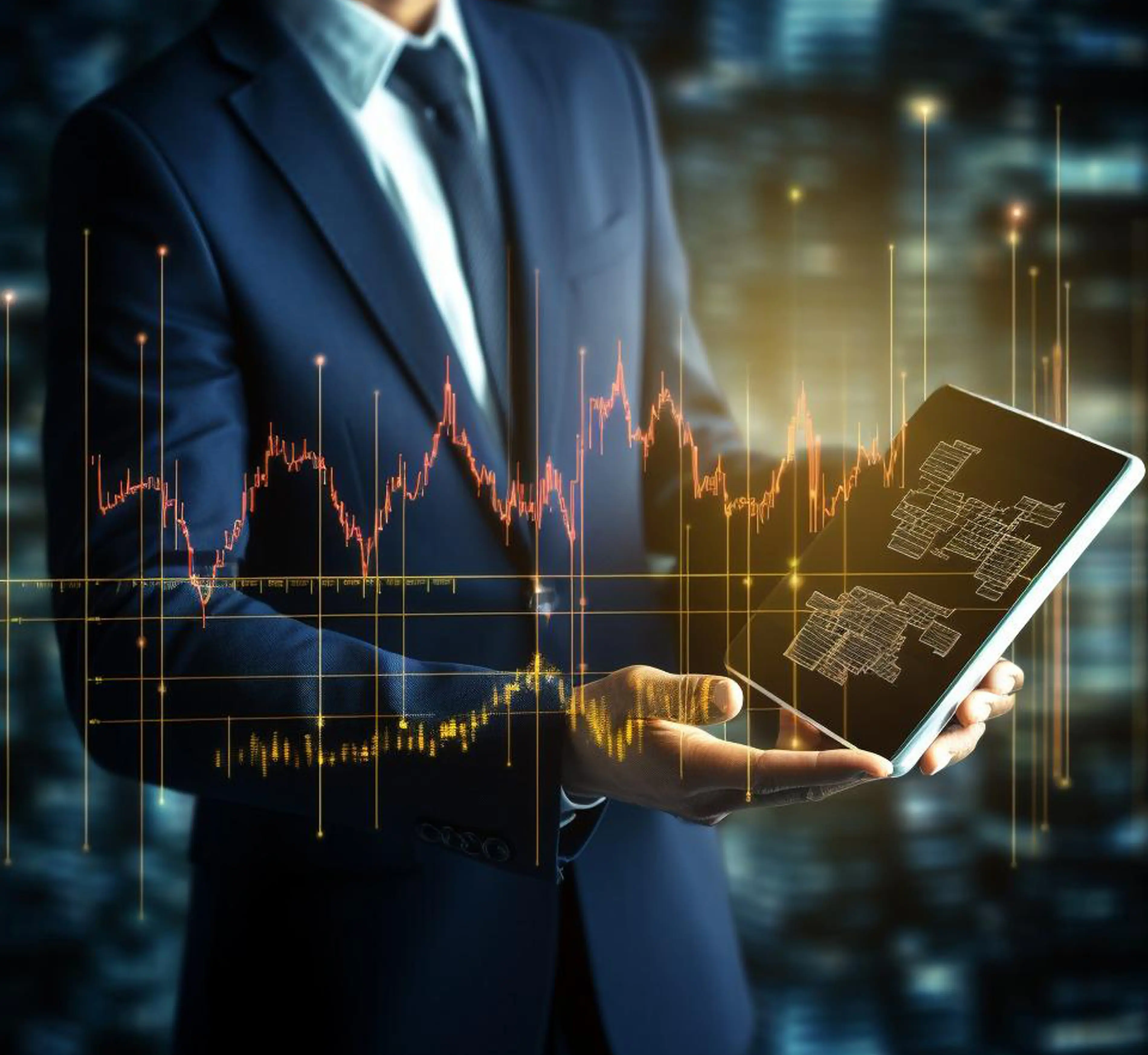Businessman holding tablet with financial charts